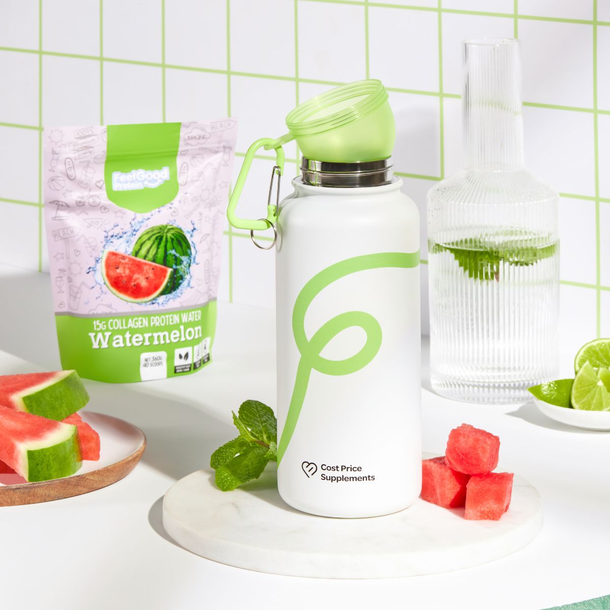 White Water bottle with green swirl pattern on a kitchen bench surrounded by cut up watermelon