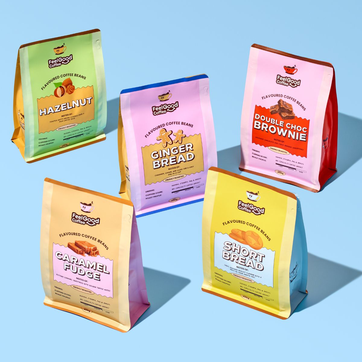 Five packages of flavoured coffee beans from Feel Good Coffee on a blue background