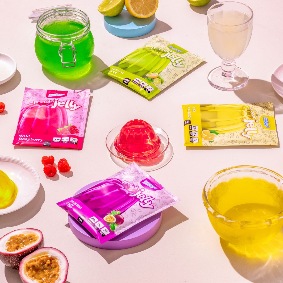 Protein Jelly by Feel Good Protein all flavours flatlay next to jelly of flavours