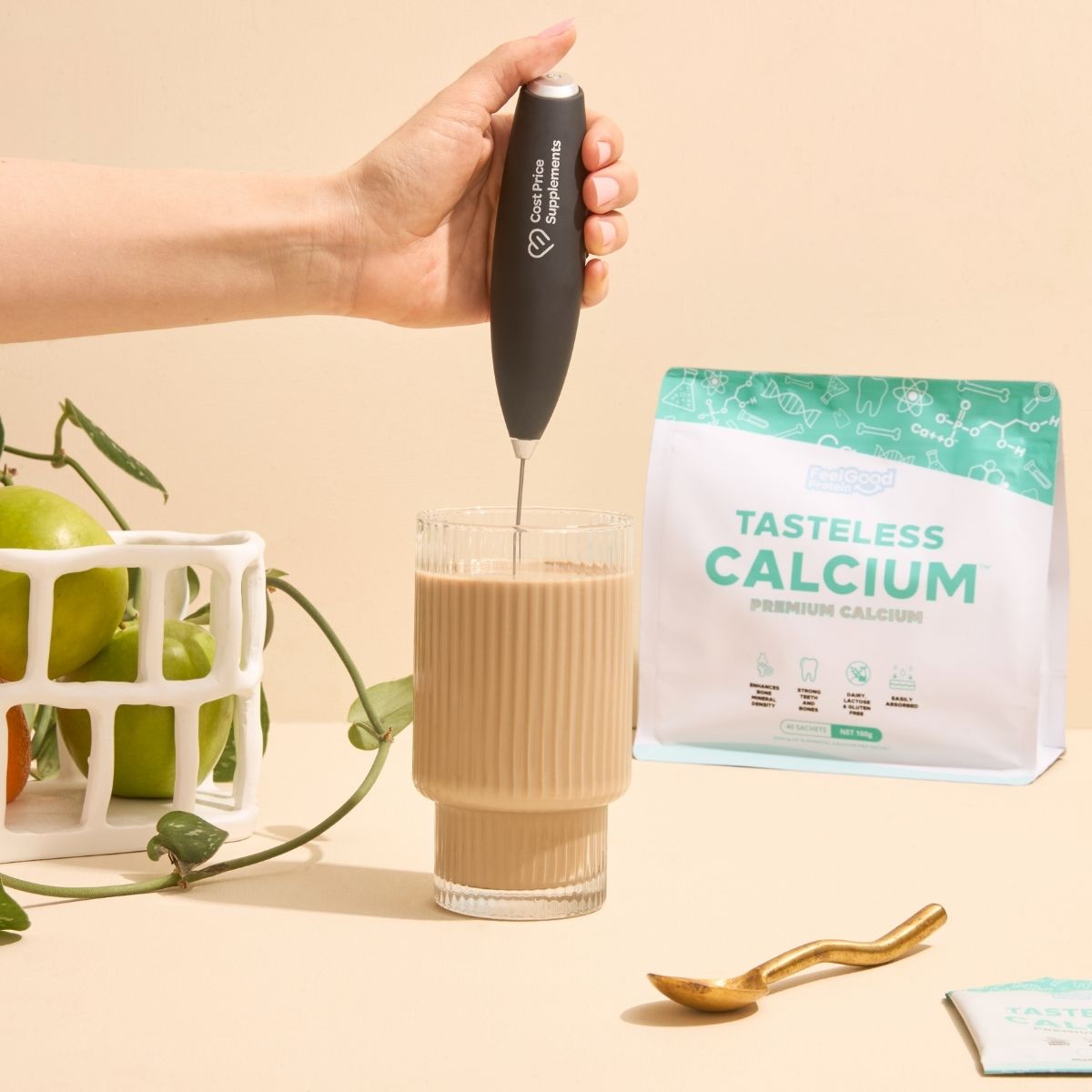 Tasteless Calcium by Feel Good Protein mixed with Cost Price Supplements Electric Hand Whisk into iced coffee