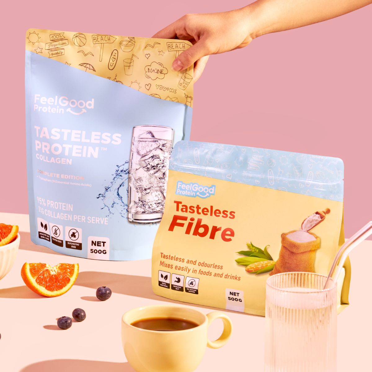 Tasteless Fibre and Tasteless Protein Bundle Pack by Feel Good Protein next to orange slices and coffee
