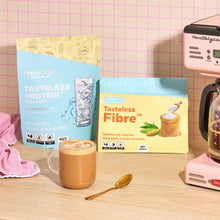 Tasteless Fibre and Tasteless Protein Bundle Pack by Feel Good Protein on a kitchen bench behind a hot coffee