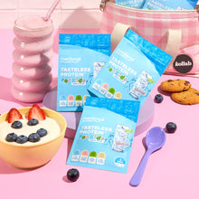 Tasteless Protein for Kids by Feel Good Protein samples next to a yoghurt bowl on a pink background
