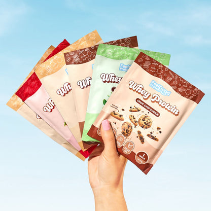 Flavoured Whey Protein 6 Samples by Feel Good Protein in front of a blue sky background