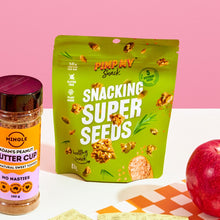Super Snacking Seeds by Pimp My Snack on dining table next to Mingle Sweet Topper seasoning