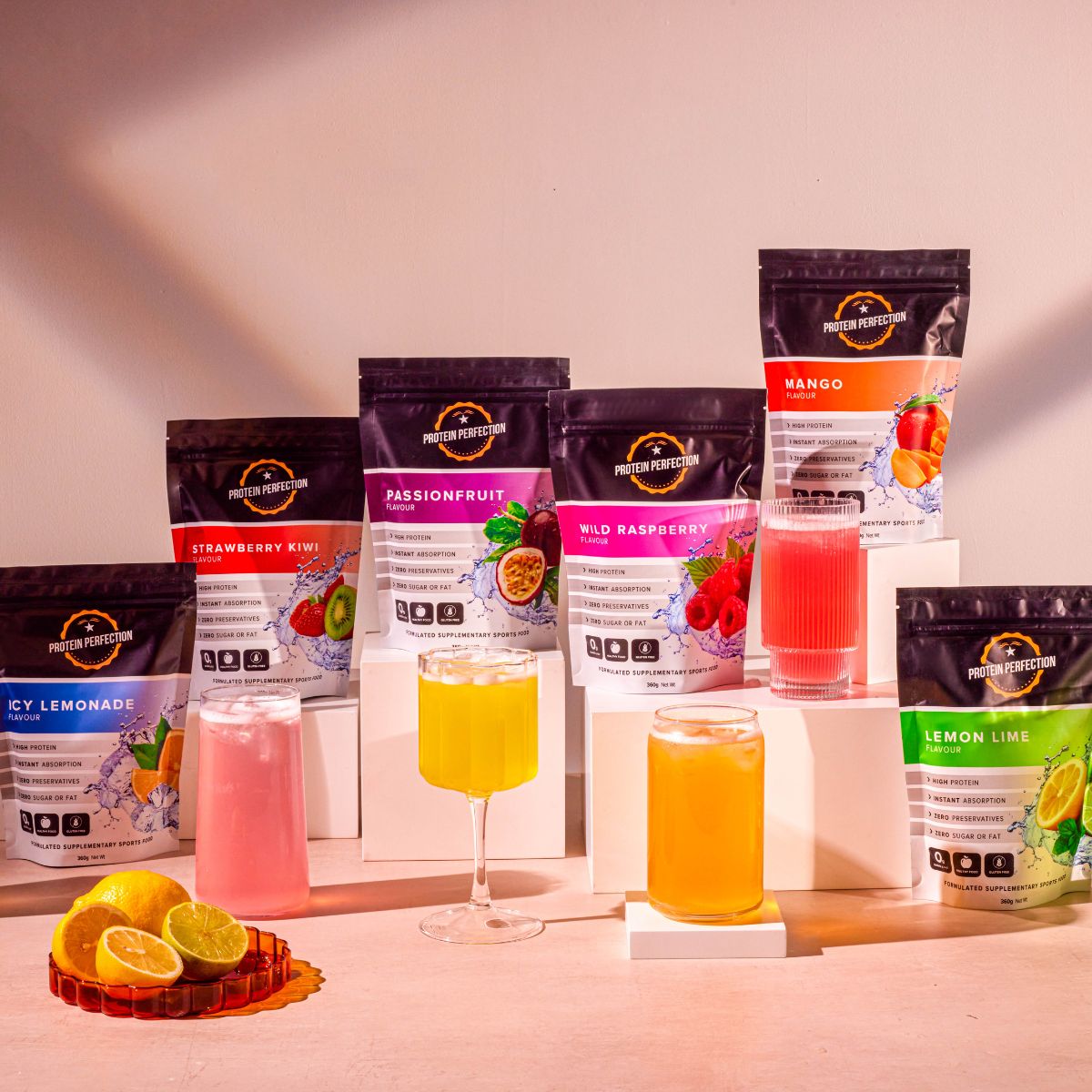 Protein Water by Protein Perfection Range on platforms next to icy cold drinks