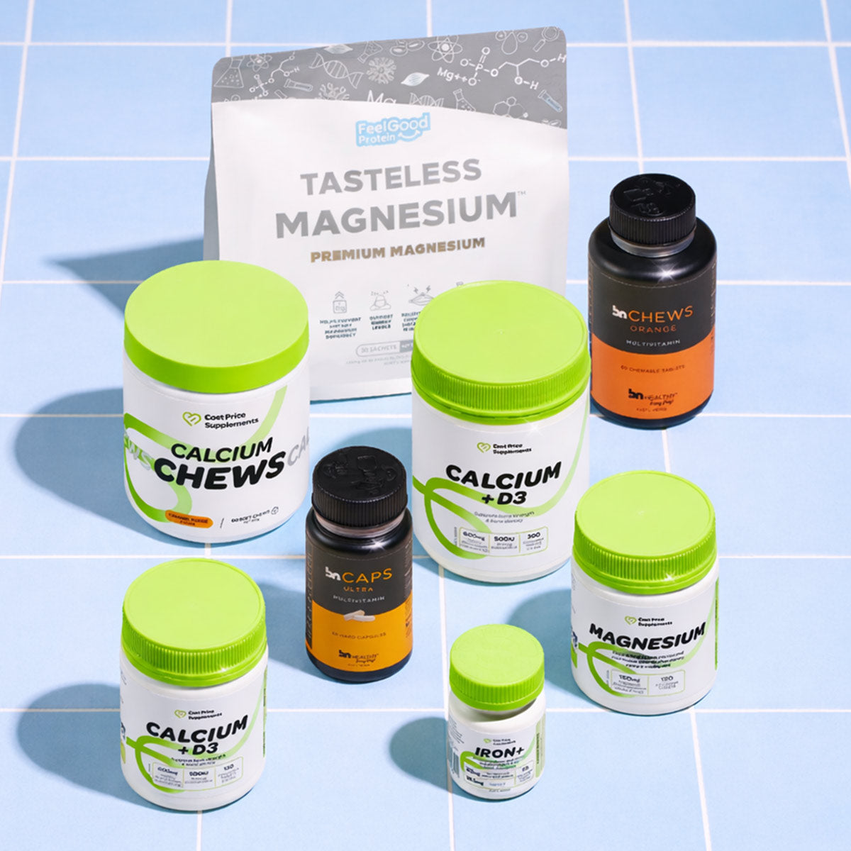 Supplement products including Calcium Chews and Tasteless Magnesium on a tiled surface.
