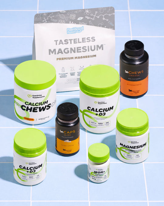 Supplement products including Calcium Chews, Magnesium, and BN Caps on a tiled background