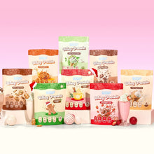 The entire Whey Protein by Feel Good Protein range including the Festive Whey flavours against a light red background